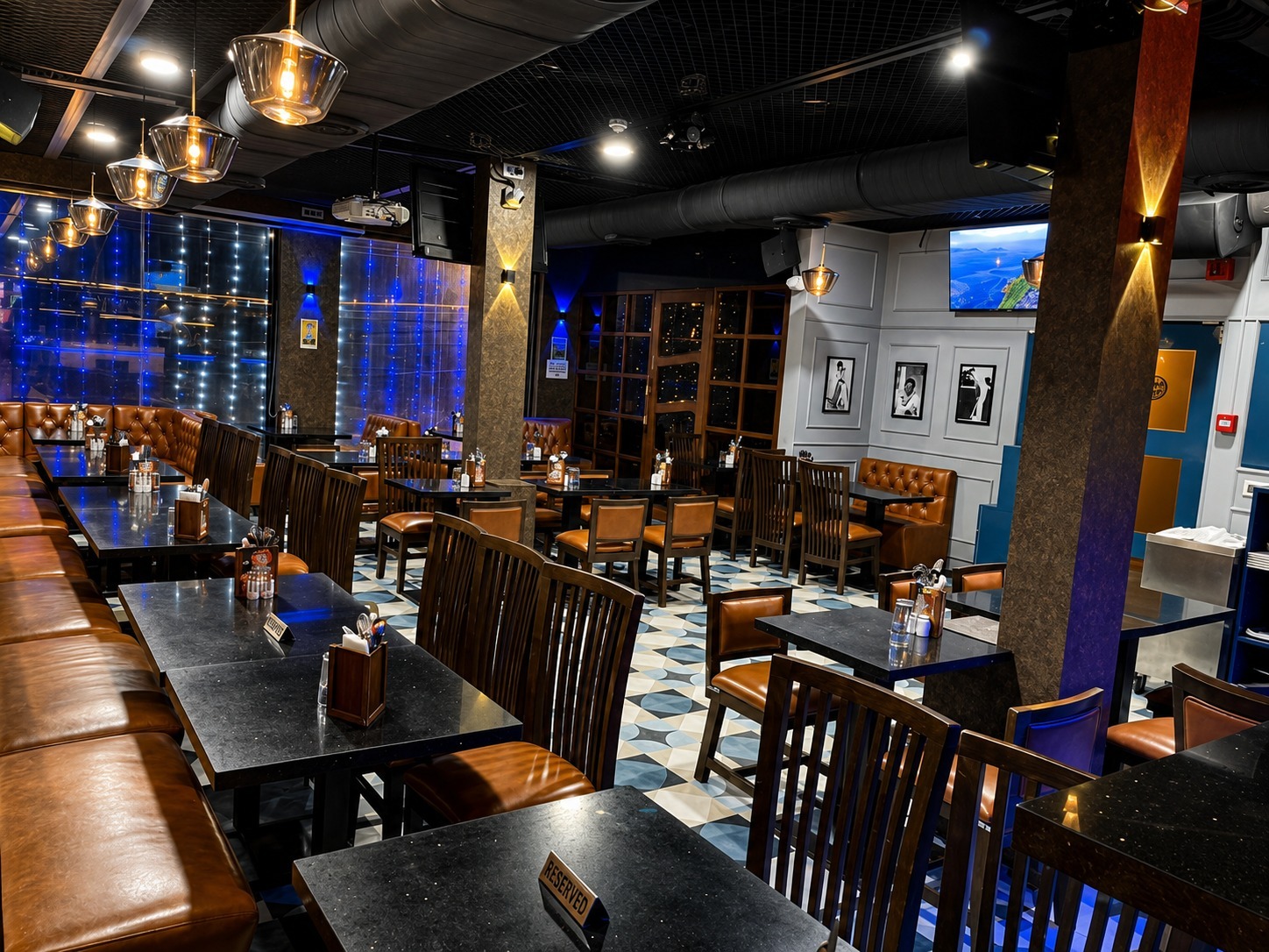 Live singing performance area with professional microphone and stage lighting at Big Bull Cafe Andheri East Mumbai
